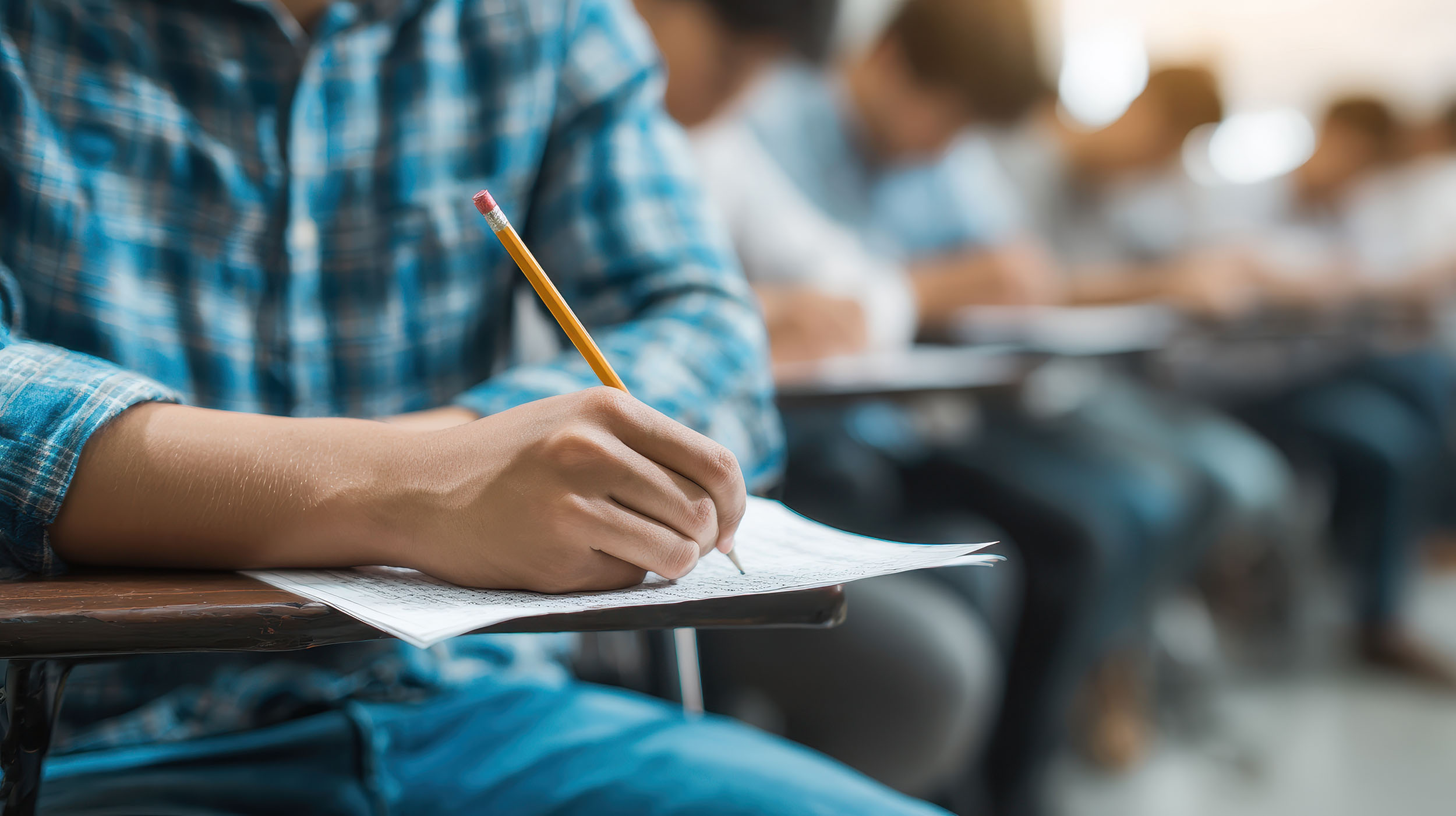 Student at desk - Orma and Kenneth Brodeur Scholarship